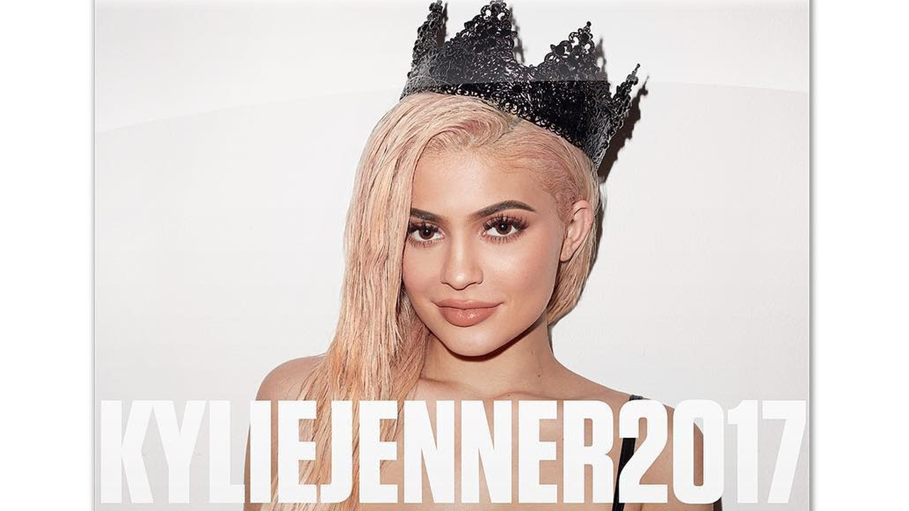 Kylie Jenner Poses With a Giant Snake in Racy New Calendar Shot by