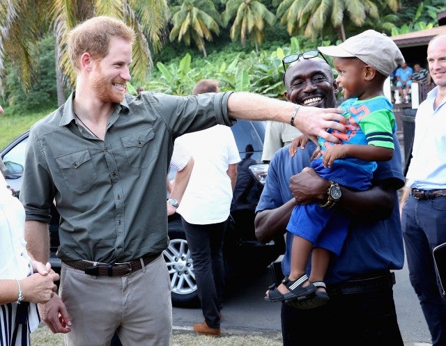 Prince Harry Meets With Children During Caribbean Visit -- See the