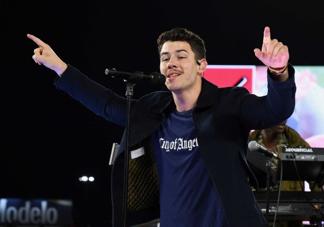 Nick Jonas performs during a field concert at Angel Stadium