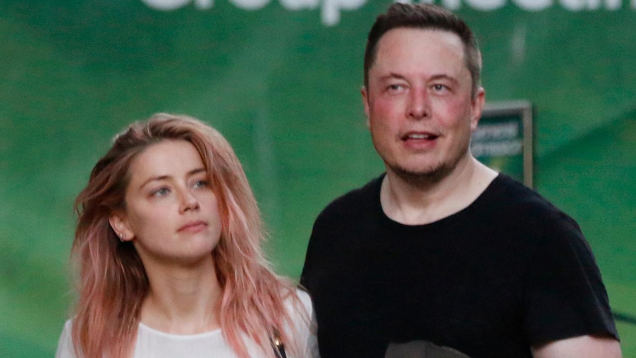 Amber Heard And Elon Musk Hold Hands On First Public Outing See The Pic Entertainment Tonight