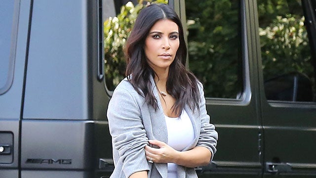AboutHer.Com - Take note: Kim Kardashian adds a pop of color to her  business look with a Hermes Kelly Pochette Bag.