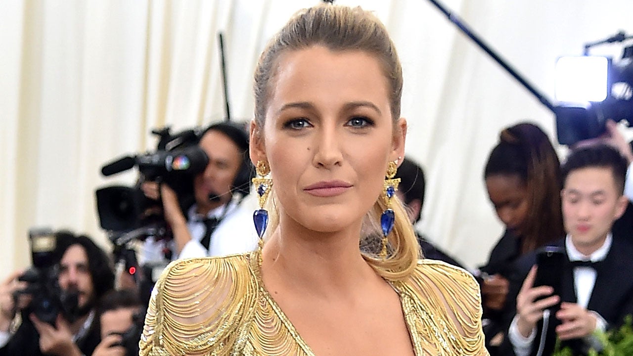 Blake Lively Stuns in Bedazzled Jersey, Holds Hands With Ryan Reynolds:  Pic!