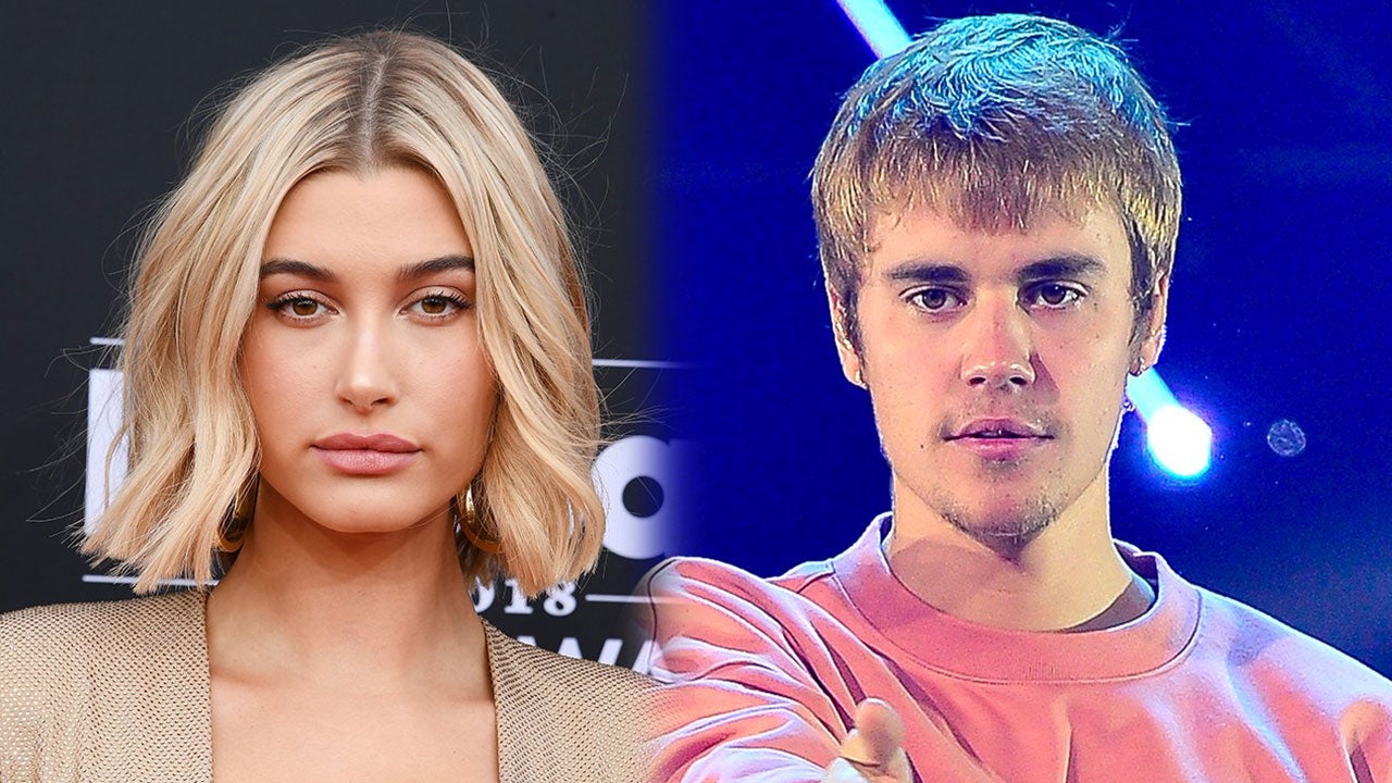 hailey baldwin and justin bieber are all smiles while justin shows