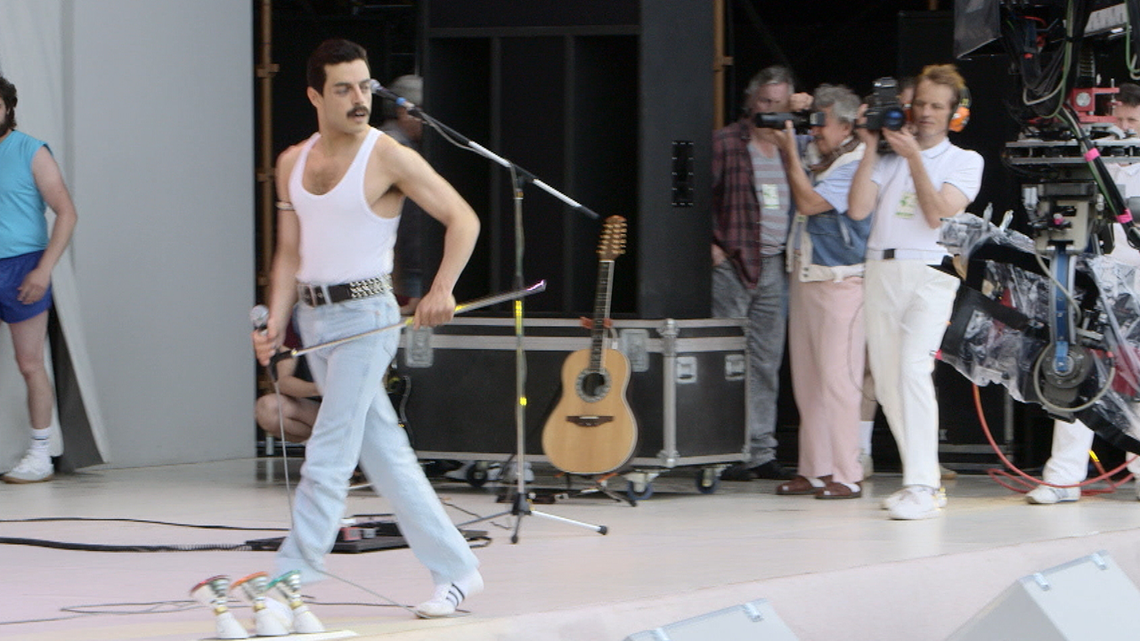How 'Bohemian Rhapsody' Costume Designer Recreated the Iconic Live Aid  Performance Look | Entertainment Tonight