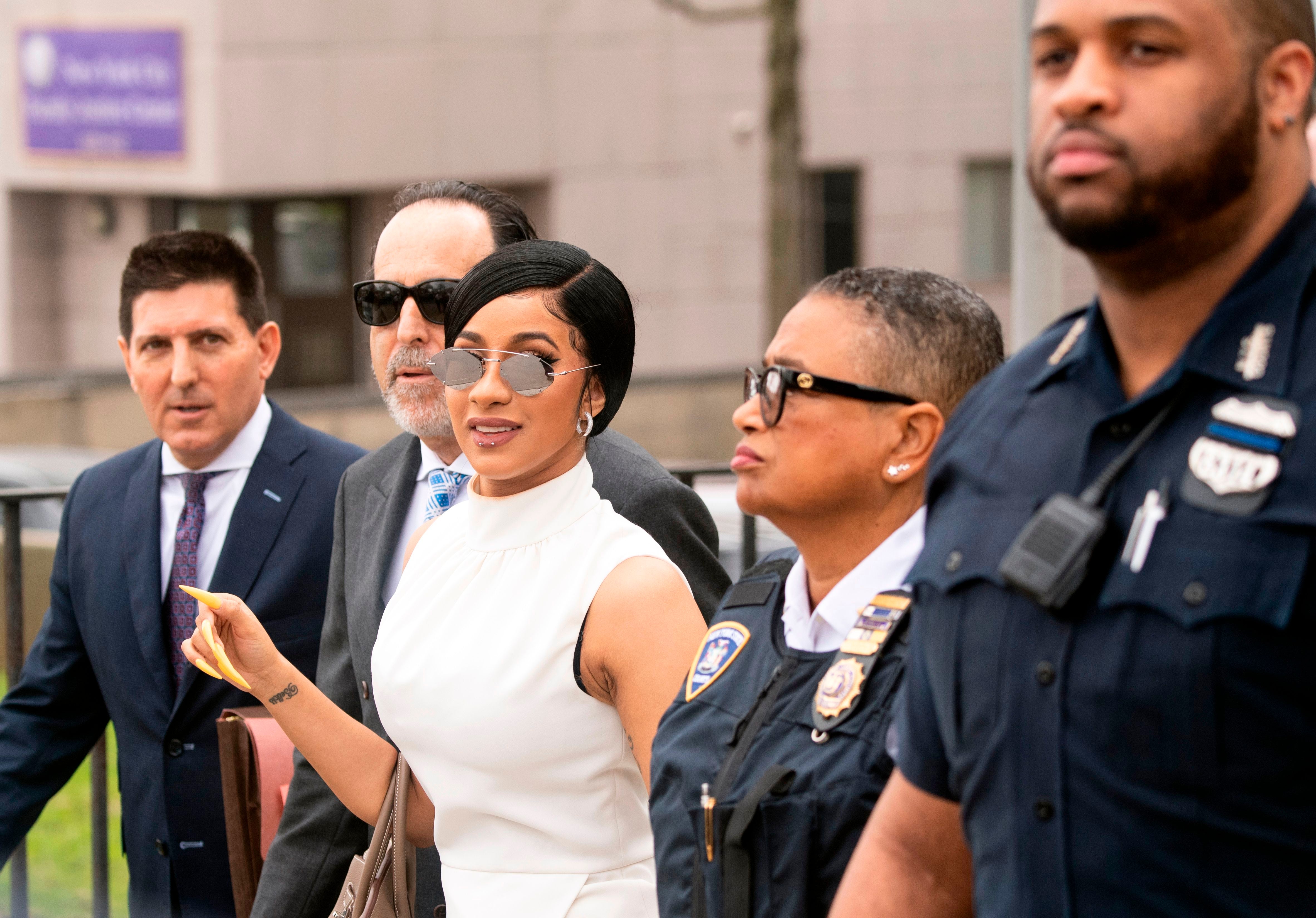 Cardi B Shows Up to Court in All-White and Shades for Alleged Strip Club  Brawl