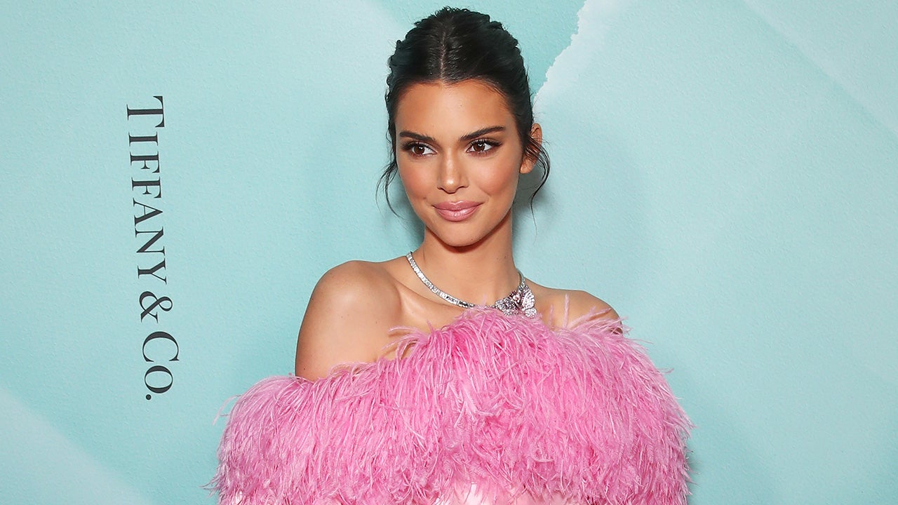 Kylie and Kendall Jenner wear co-ordinating dramatic feathered