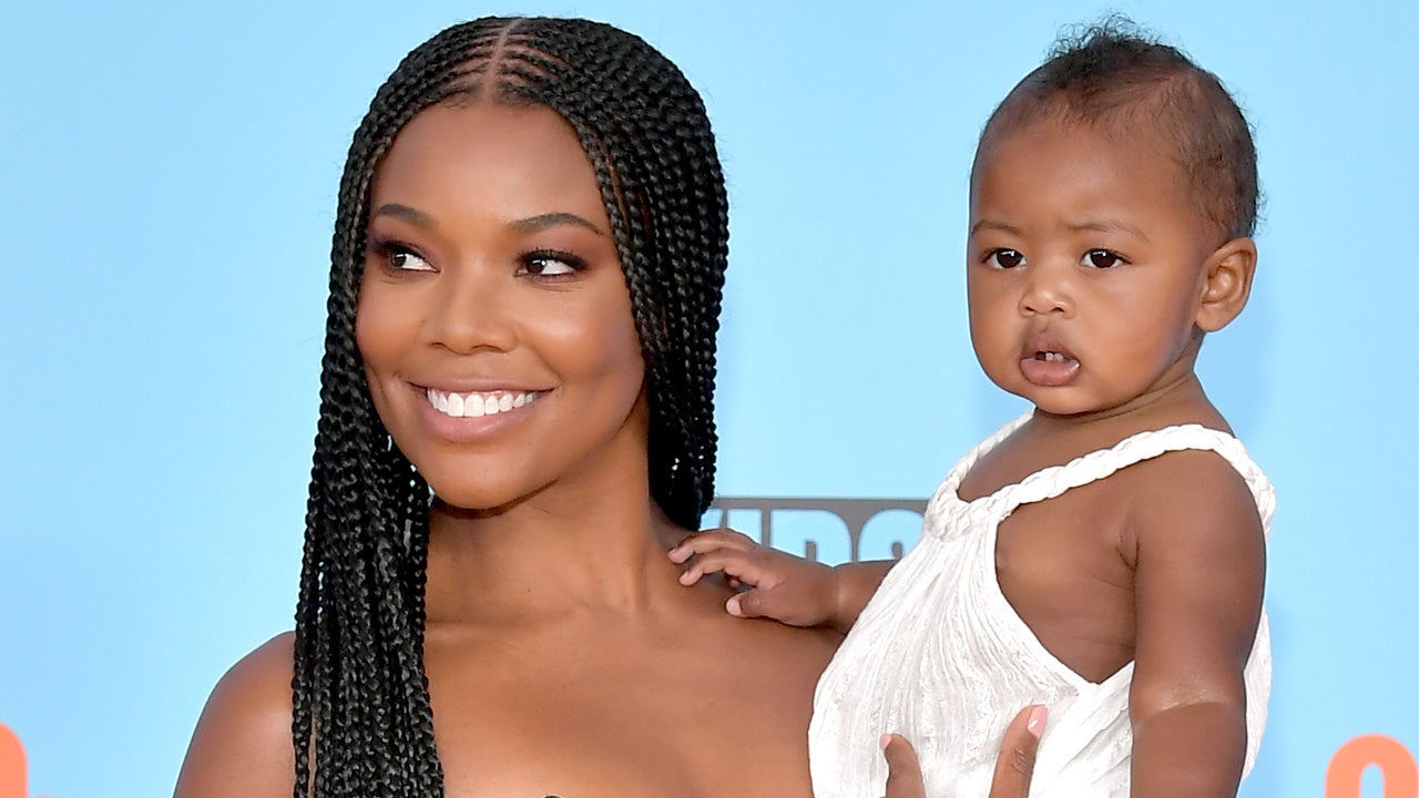 Gabrielle Union Dresses Up 10 Month Old Daughter Kaavia In Bring It On Cheerleader Uniform Entertainment Tonight