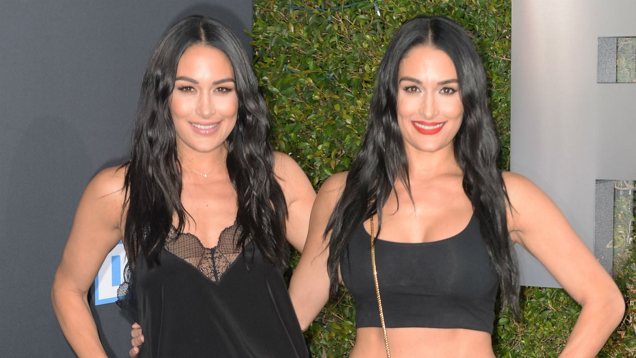 Nikki Bella turns heads in thigh high boots as she and sister Brie announce  new beauty and body line
