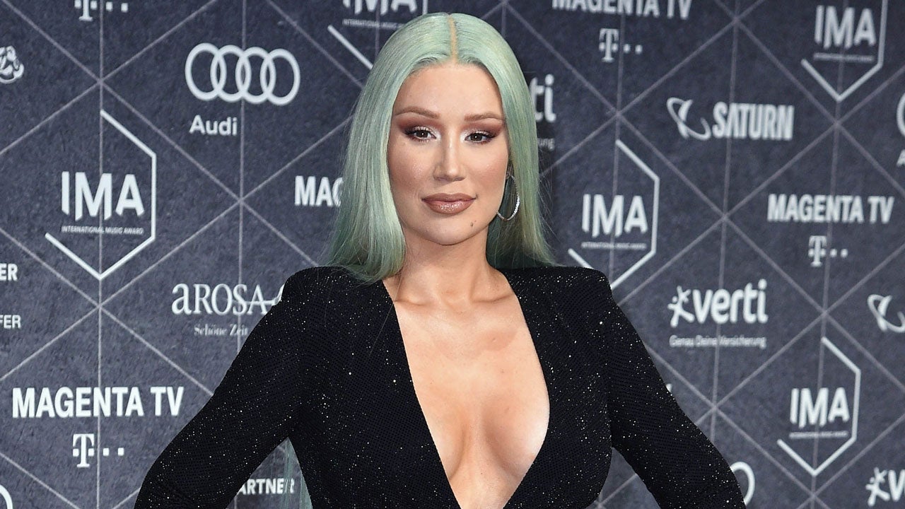 Iggy Azalea,28, holds hands with new 'boyfriend' Playboi Carti, 22, at  Rolling Loud Festival in Los Angeles. (Photos)