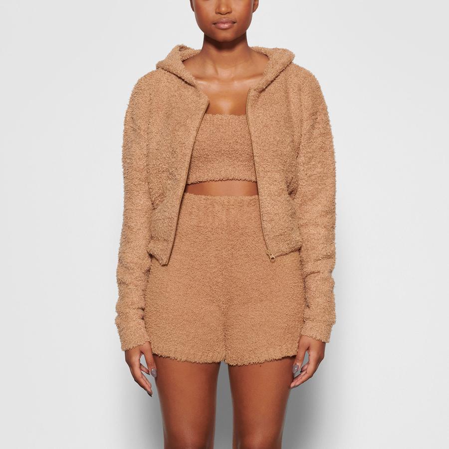SKIMS on X: The perfect lounge set: our Cozy Knit Jogger and Cozy Knit  Wrap Top in Camel   / X