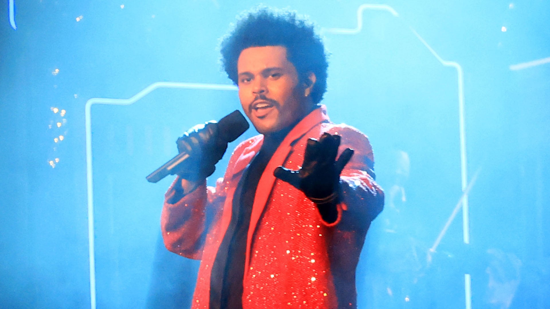 The Weeknd, pop's anti-pop star, glides through the Super Bowl halftime show