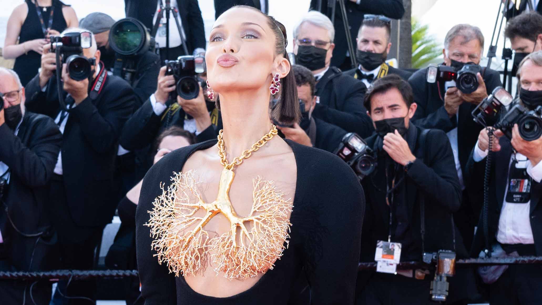 Bella Hadid Stuns With Incredible Gold-Dipped Lungs Look at Cannes Film  Festival 2021, 2021 Cannes Film Festival, Bella Hadid