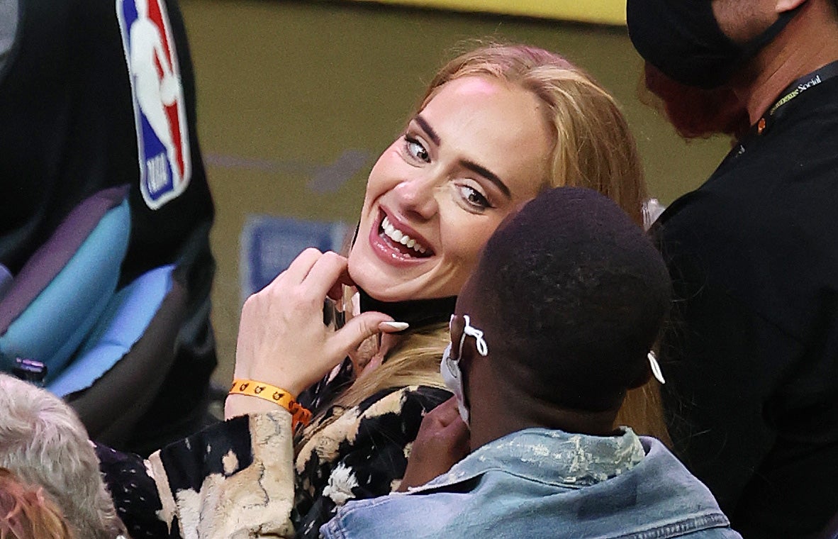 Adele goes glam in Louis Vuitton at NBA game with Rich Paul