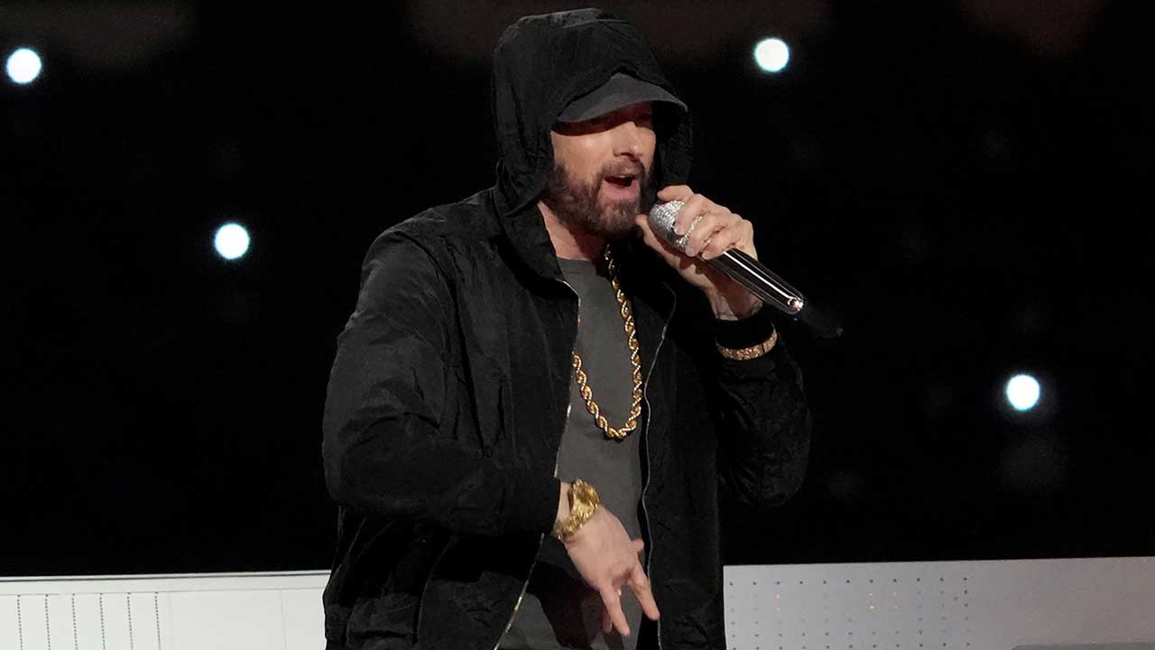 Eminem kneels during Super Bowl LVI halftime show