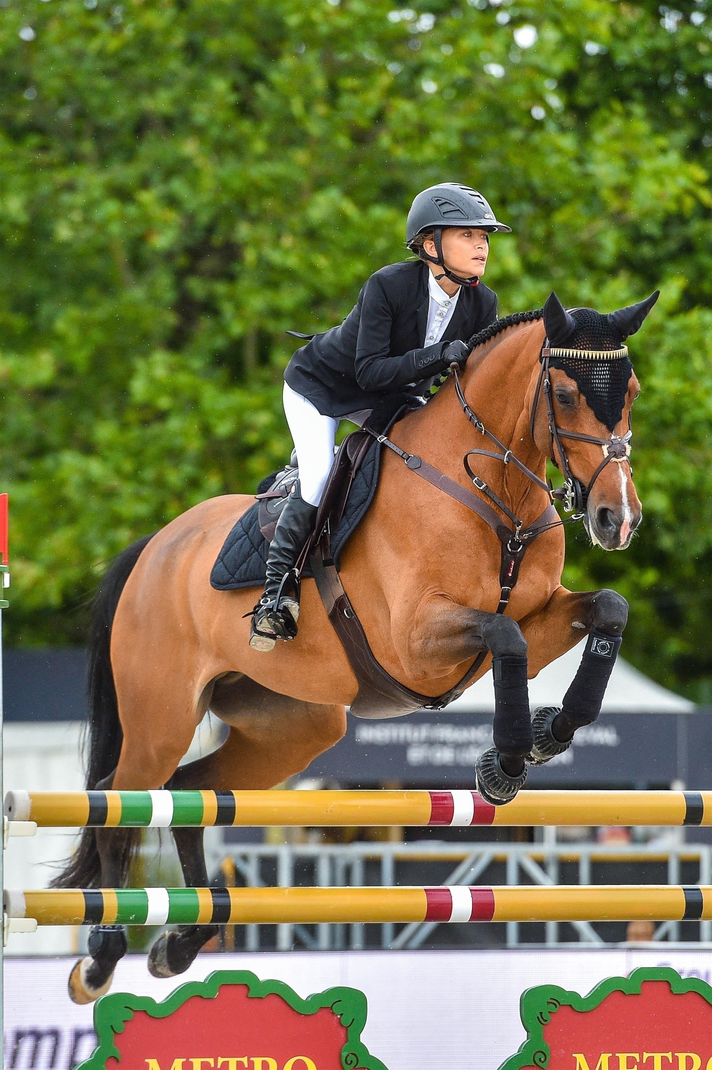 Mary Kate Olsen Soars on Horseback During Paris Jumping