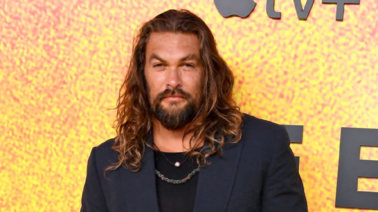 Jason Momoa shows off new head tattoo as he heads to Aotearoa