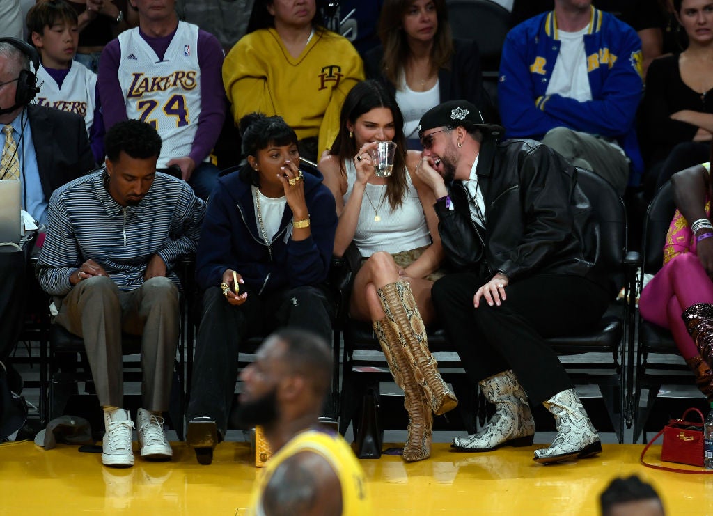 Just Jared on Instagram: Kendall Jenner gets cozy with Bad Bunny courtside  at the Lakers playoff game in Los Angeles #BadBunny #KendallJenner Photos:  Getty, Backgrid