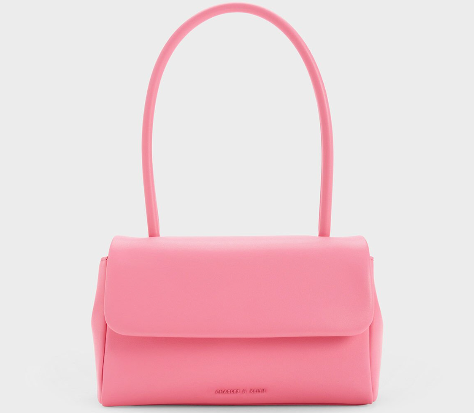 One of the summer's hottest accessories is this $33 pastel shoulder bag