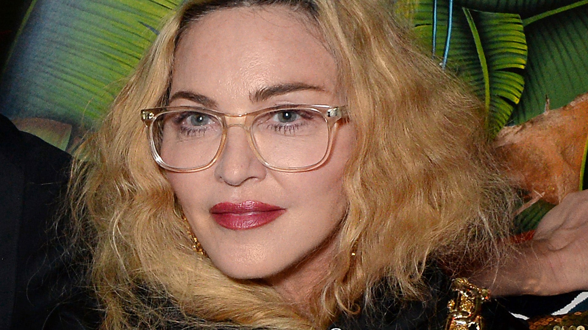 Madonna recovering at home following 'serious' hospitalization