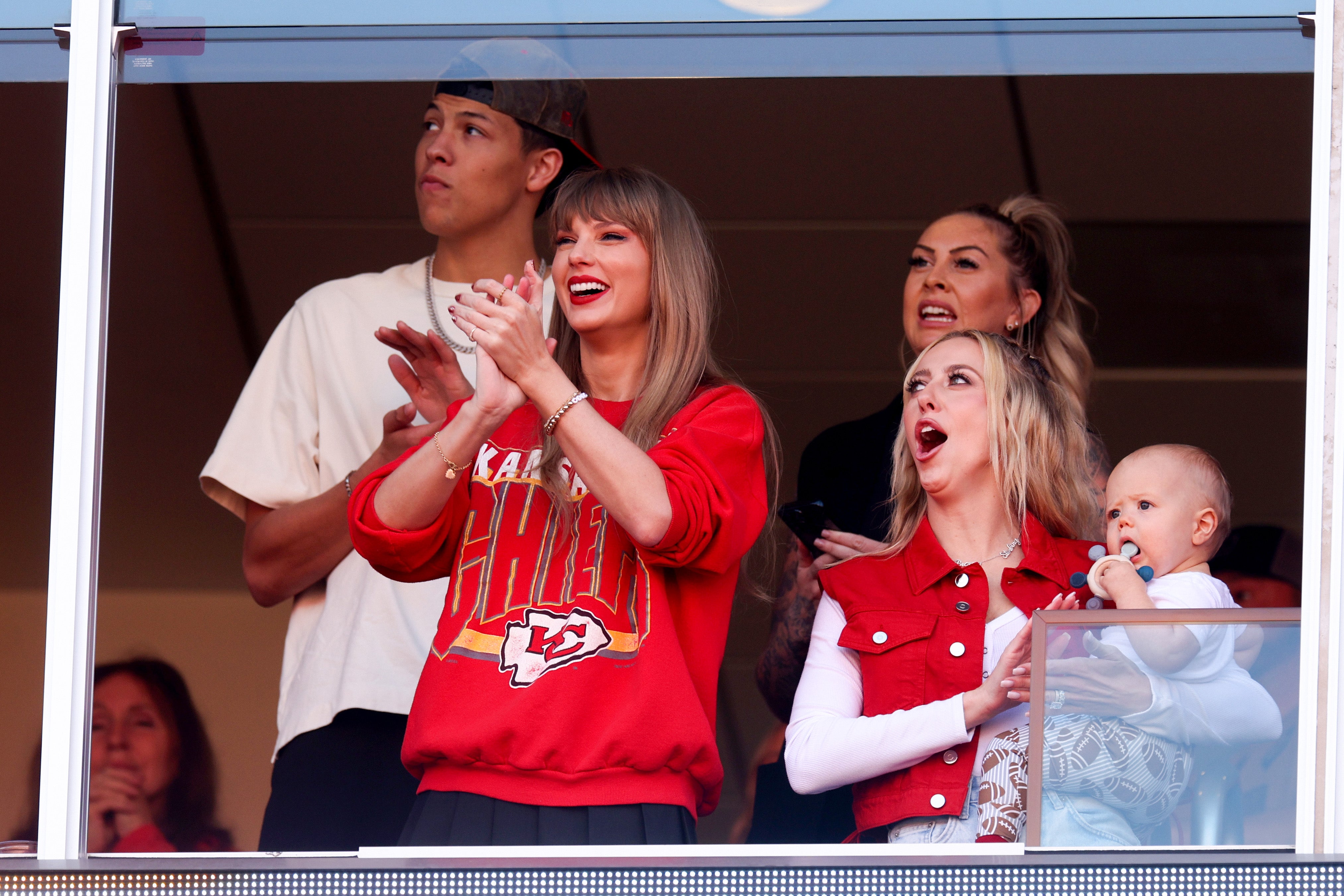 Inside Travis Kelce's close-knit family as 'girlfriend' Taylor Swift  watches NFL game with his mother Donna