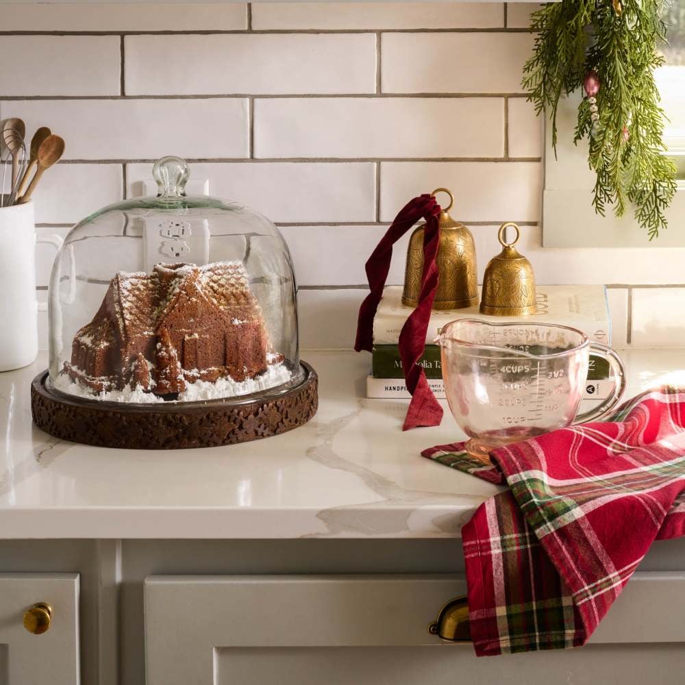 https://www.etonline.com/sites/default/files/images/2023-11/Gingerbread%20House%20Bundt%20Cake%20Pan.jpg?width=320