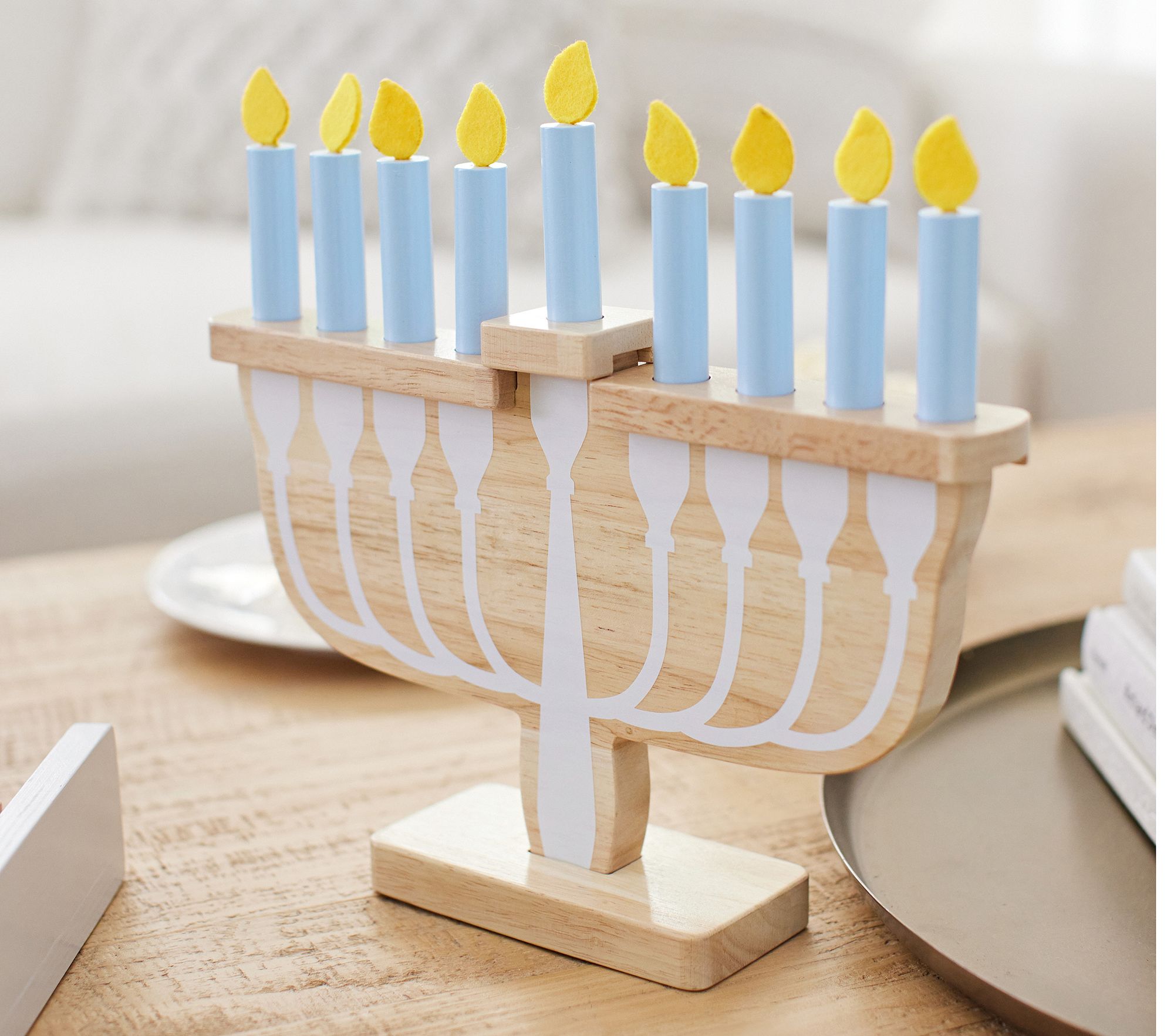 https://www.etonline.com/sites/default/files/images/2023-11/Wooden%20Toy%20Menorah.jpg?crop=1:1&width=580