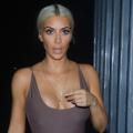 WATCH: Kim Kardashian Sports Low-Cut Bodysuit -- and Manages to Make Denim Bermuda Shorts Look Sexy!