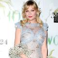 Kirsten Dunst Wears a Boa Made Entirely of Flowers -- See the Whimsical Style Statement