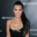 Kourtney Kardashian Stuns In Baby Blue Tube Top On Italian Vacation -- Pic