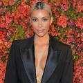 Kim Kardashian Teases Family's Christmas Card With Adorable Saint West Photo