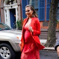 Chrissy Teigen Flaunts Baby Bump in Red Hot Ensemble -- See the Look!