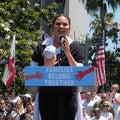 Chrissy Teigen and Baby Miles Introduce John Legend at Families Belong Together March 