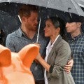 These Pics of Meghan Markle and Prince Harry Cuddling in the Rain Prove True Love Exists