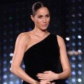 Meghan Markle Cradles Baby Bump as She Honors Her Wedding Dress Designer