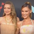 2019 VMAs: Watch Gigi and Bella Hadid Hit the Red Carpet in Sleek Monochromatic Looks!