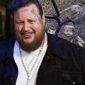 Jelly Roll Reacts to Shattering His CMA Award Backstage (Exclusive)