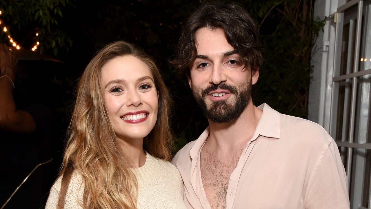 Elizabeth Olsen (L) and Robbie Arnett attend the 2017 Gersh Emmy Party presented by Tequila Don Julio 1942 on September 15, 2017 in Los Angeles, California. 