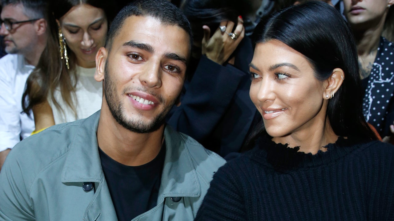 Kourtney Kardashian smiles at her boyfriend Younes Bendjima 