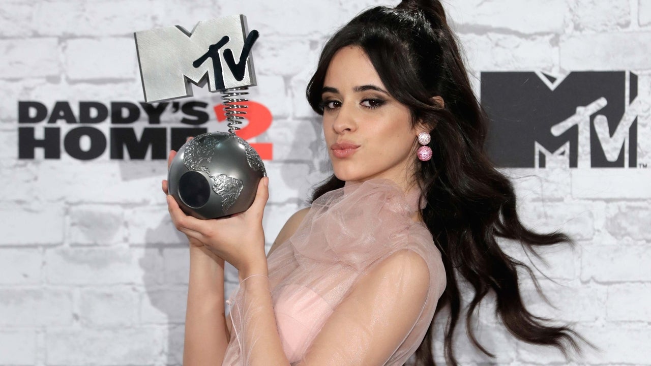 Camila Cabello Holds Her Trophy at the 2017 MTV EMAs