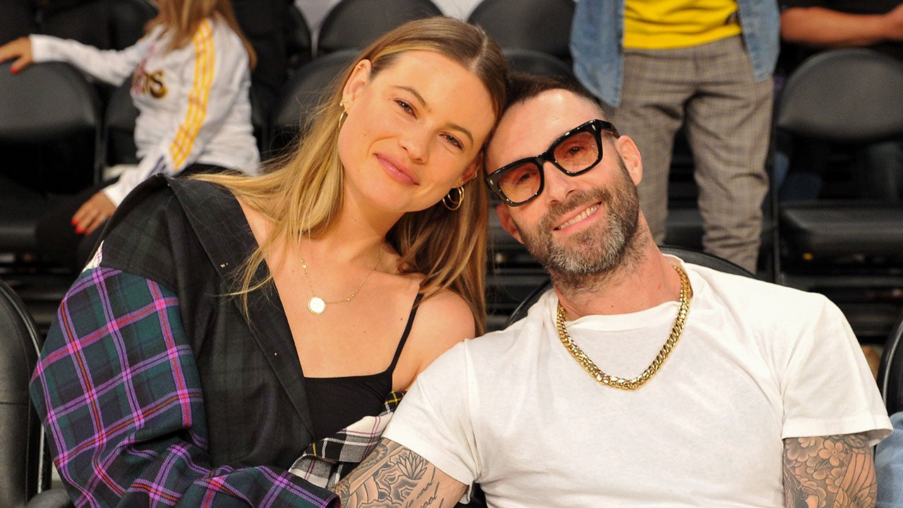 Behati Prinsloo and Adam Levine at Lakers vs Rockets game