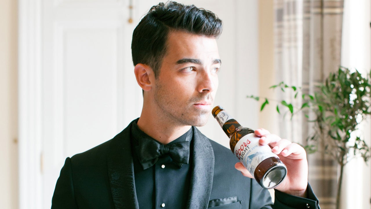 Joe Jonas with coors light on wedding day