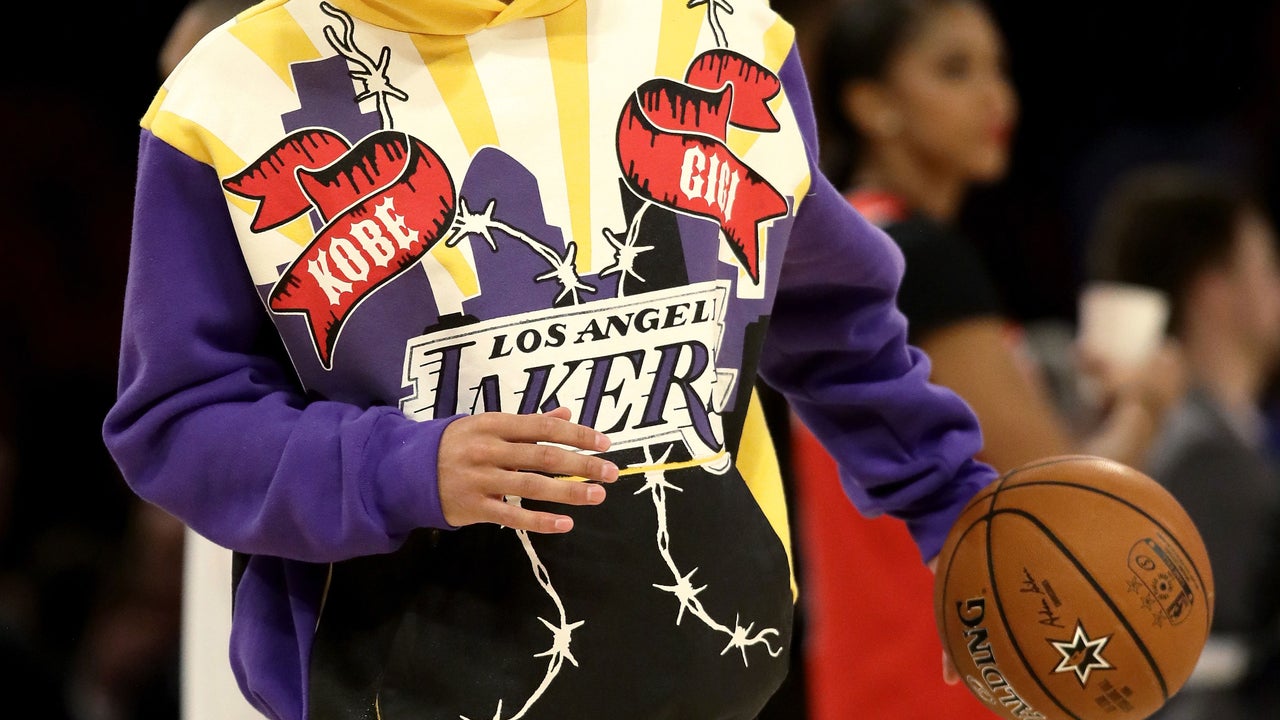 Devin Booker rocks this Lakers sweatshirt before the All-Star Game