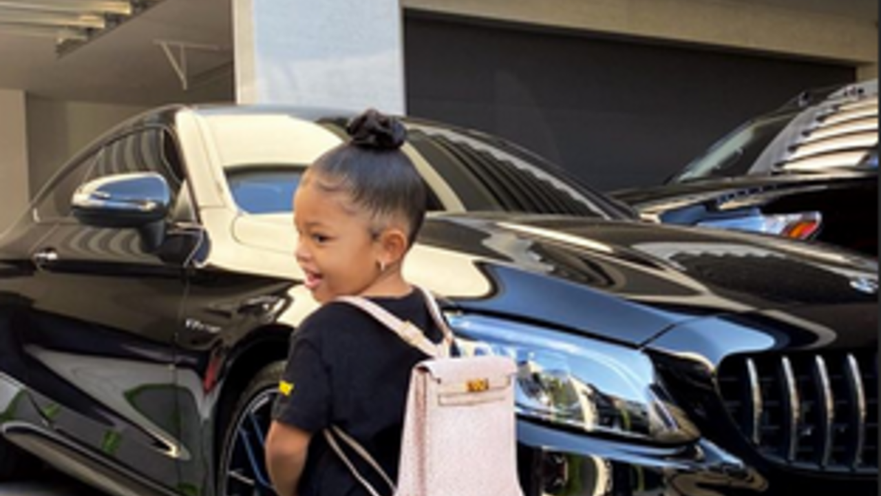 But, why? Kylie Jenner proudly shares snap of daughter Stormi attending  first day of home school in Air Jordans, diamond studs, and a $12,000  Hermès backpack - Luxurylaunches