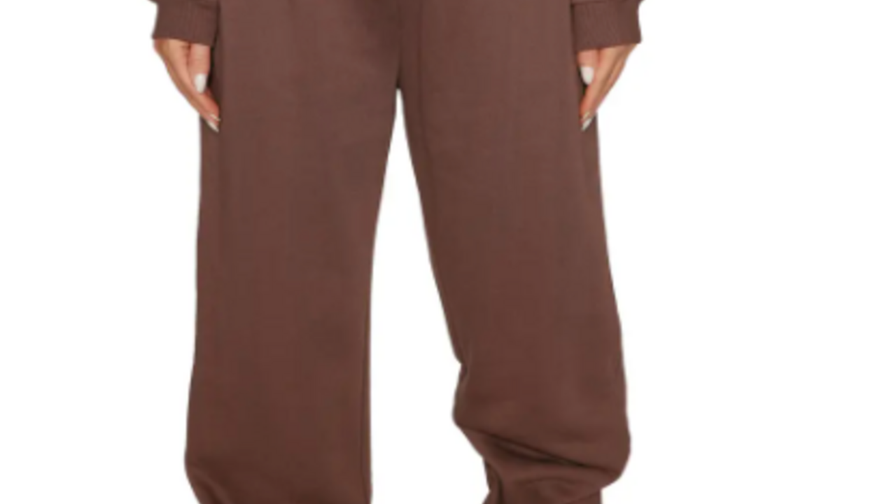 Who made Jennifer Lopez's brown sweatshirt, sweatpants, suede