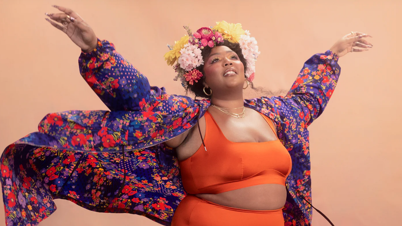 Lizzo Wears Red Sports Bra, Leggings With Nike Sneakers for