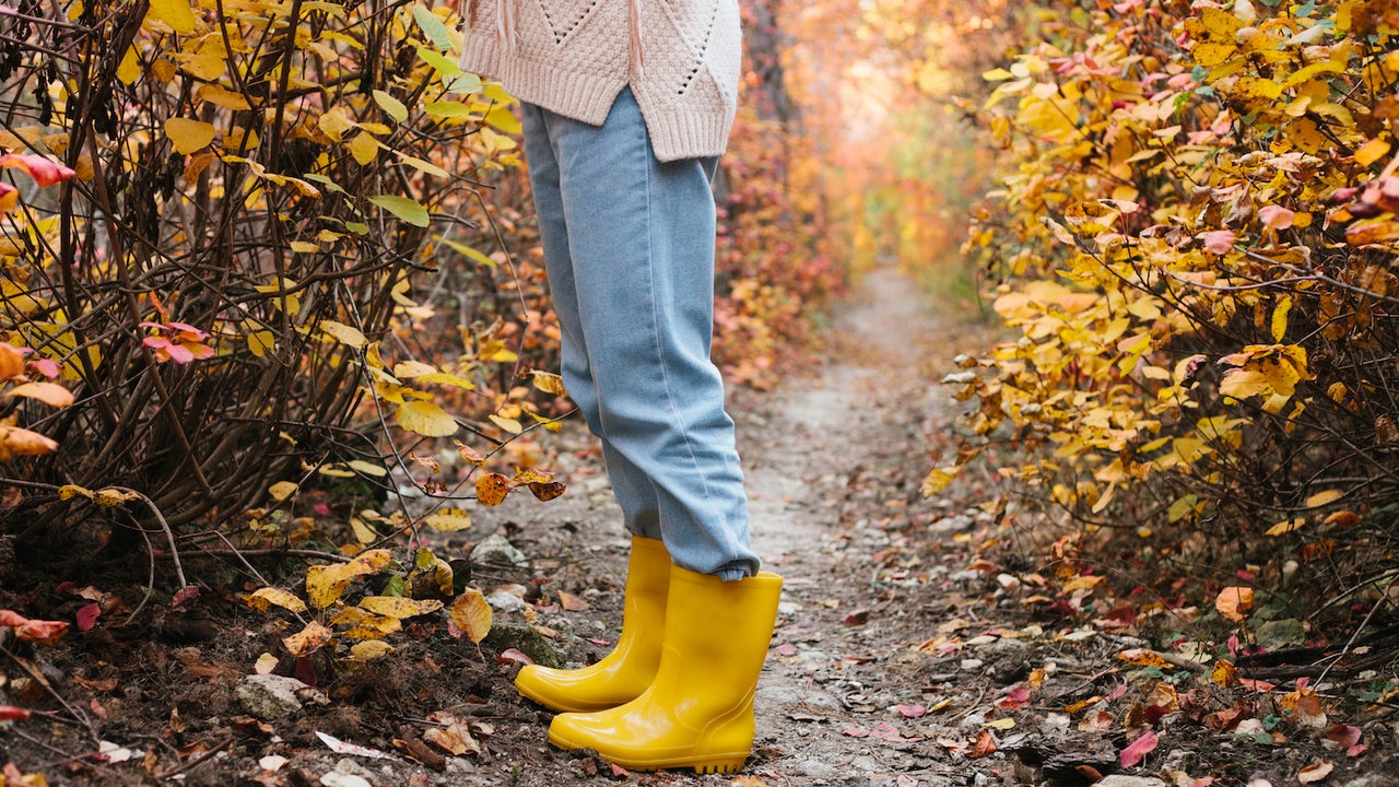 woman wearing rain boots