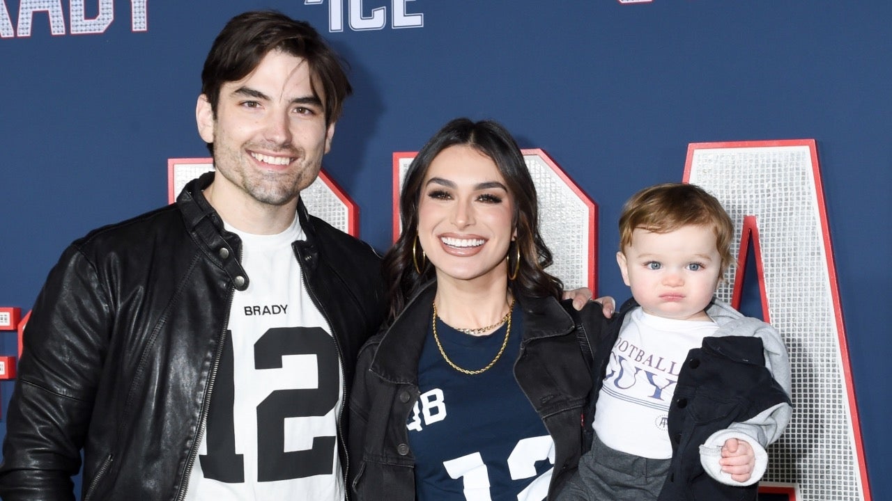 Jared Haibon and Ashley Iaconetti pose with their son Dawson