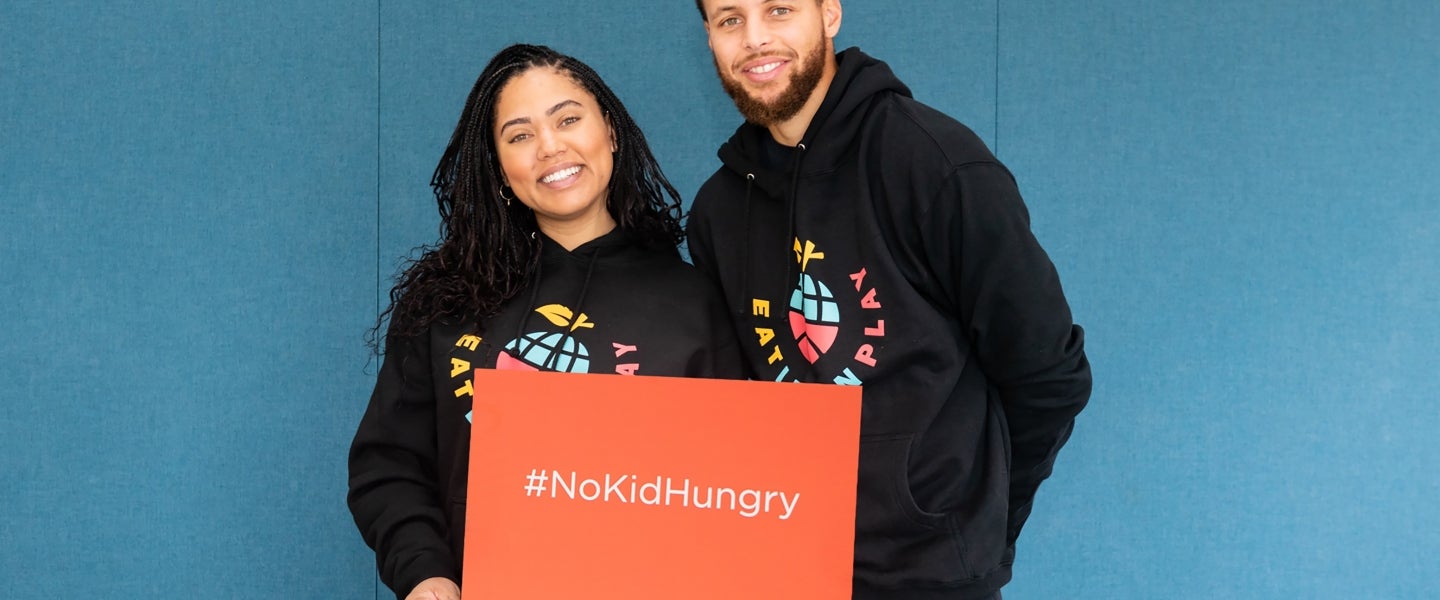 Steph and Ayesha Curry with Eat. Learn. Play. Foundation