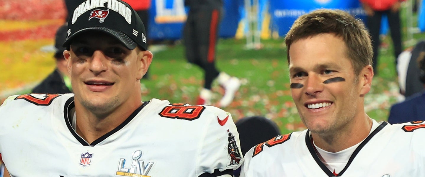 Tom Brady and Gronk Channel Top Gun for SHIRTLESS Beach Football! 