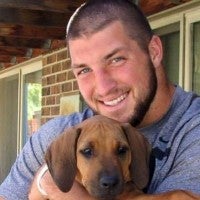 Tim Tebow Breaks Down Sobbing as He Feeds His Dog For The Last Time